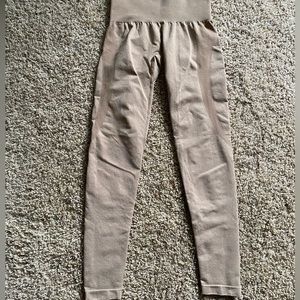 NVGTN leggings. Brown/gold color. Size x-small.